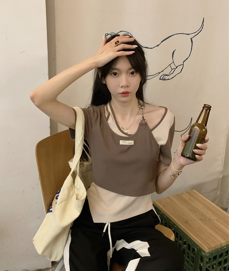 Fashion super hot Korean style irregular fake two-piece short-sleeved women's summer niche design hot girl short slim-fitting top