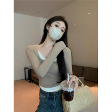 批发韩国外贸假两件长袖t恤女春季小众修身内搭不规则打底衫甜辣上衣