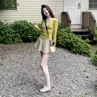 黄色针织衫长袖气质修身独特别致上衣女2024新高腰百褶半身裙套装