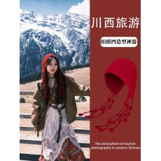 批发川西旅游流苏球球针织帽女秋冬出游保暖百搭护耳绑带民族风包头帽