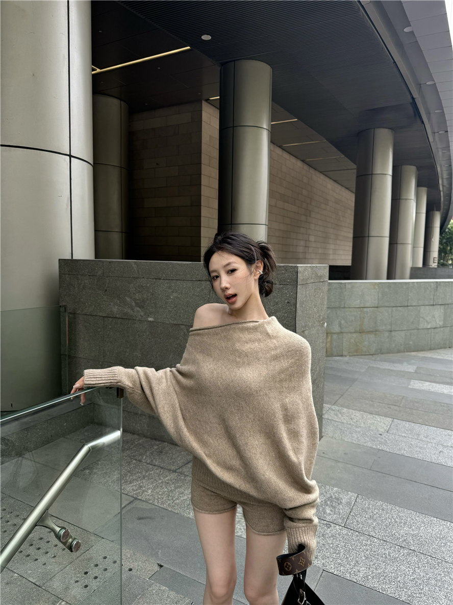 Real shot of lazy style bat knitted sweater, loose casual top and shorts suit in autumn