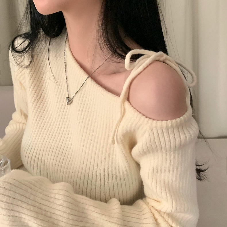 Korean chic autumn and winter niche retro irregular oblique collar off-shoulder lace-up slim slim long-sleeved knitted sweater for women