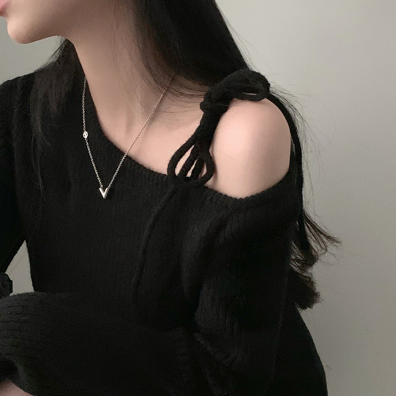 Korean chic autumn and winter niche retro irregular oblique collar off-shoulder lace-up slim slim long-sleeved knitted sweater for women