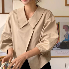 批发2026春装<b class='q'>韩国</b>法式设计感翻领不规则交叉宽松百搭长袖风衣短外套女