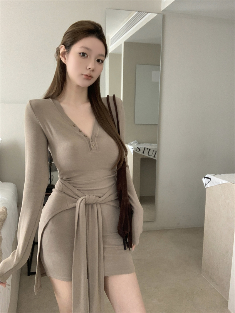 Real shot, killer waist-to-hip ratio, pure lust fake two-piece strappy long-sleeved dress