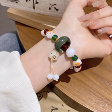 批发新中式中古风可爱炭烧猫爪手链女仿白玉菩提子绕指柔文玩手串手饰