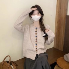 批发韩系彩色纽扣长袖针织毛衣2026秋冬新款设计感小众宽松别致上衣女