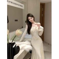 批发纯欲风<b class='q'>一字领</b>长袖连衣裙女秋冬2024新款拼接蕾丝针织鱼尾中长裙子