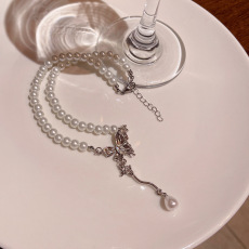 批发韩系超仙气质长款流苏蝴蝶项链女轻奢小众高级感珍珠锁骨链颈链