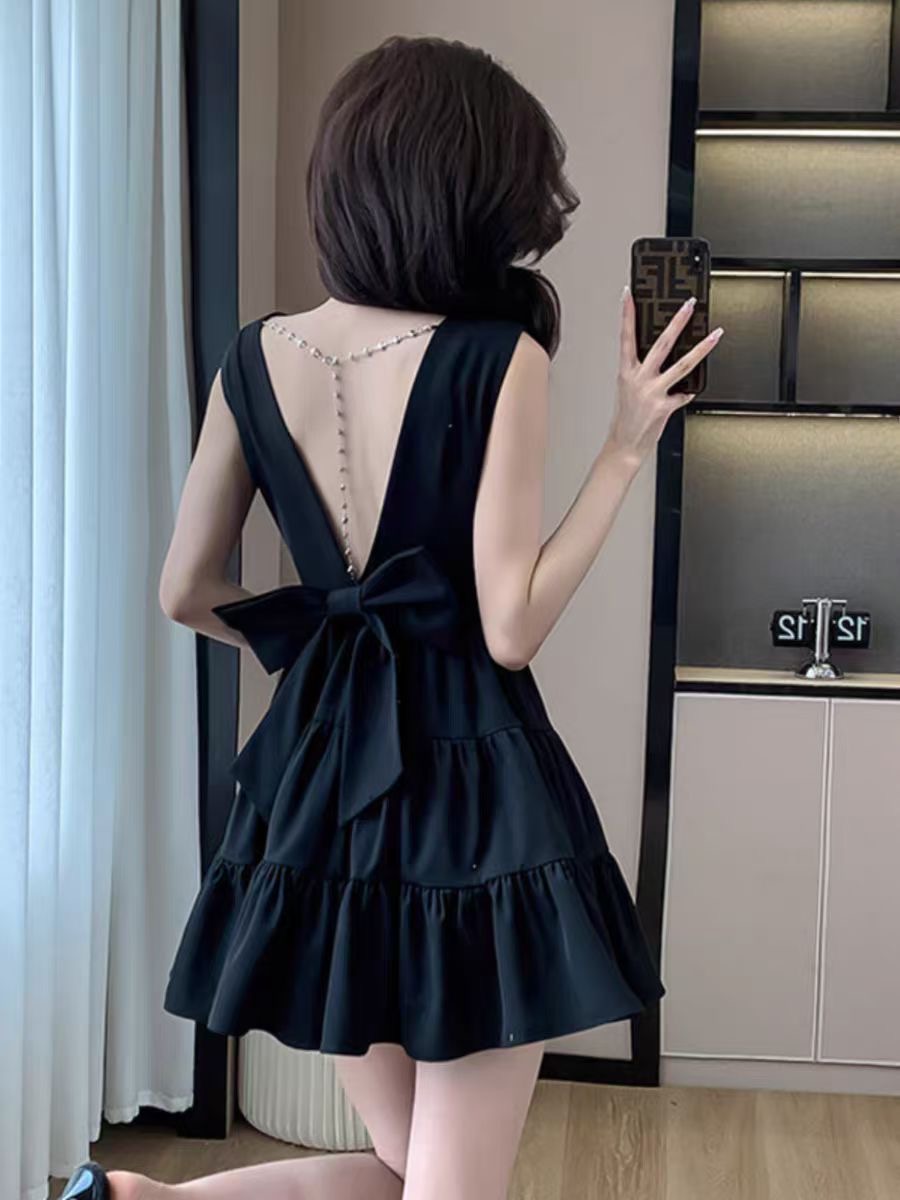 FA27678# 时尚无袖露背蝴蝶结连衣裙女夏季新款显瘦气质A字裙潮 服裝批發女裝批發服飾貨源
