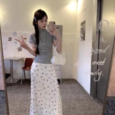 批发2024夏季度假风蝴蝶结印花蕾丝镂空碎花鱼尾半身裙显瘦纯欲长裙子