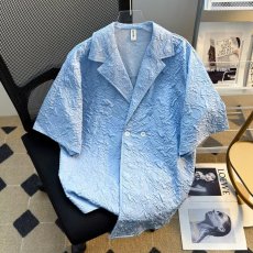 批发高级感轻奢短袖<b class='q'>西服</b>男韩版小众冷淡风翻领褶皱浮雕时髦发型师西装