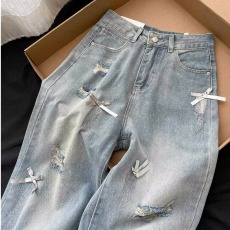 批发2024美式复古蝴蝶结破洞牛仔裤女<b class='q'>夏</b>新款磨破设计感怀旧直筒裤