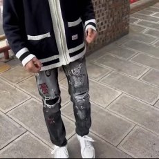 批发2025美式潮牌春季新款黑色个性泼墨涂鸦黑白撞色修身<b class='q'>牛仔裤</b>