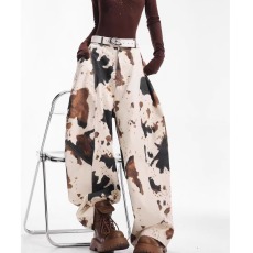 批发美式复古奶牛纹迷彩牛仔<b class='q'>裤</b>女2025年秋季流行风格<b class='q'>宽松</b>廓形弯刀<b class='q'>裤</b>子