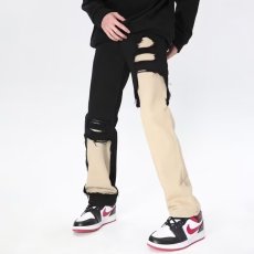 批发美式高街vibe风裤子黑白拼接破洞牛仔裤男款窄版<b class='q'>修身</b>显瘦微喇长裤