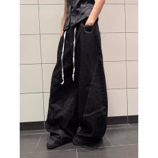 批发美式高街水洗弯刀裤女春秋捏褶拼接<b class='q'>设计</b>感牛仔裤直筒宽松显瘦长裤