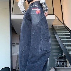 批发美式复古水洗解构弯刀牛仔裤女2026新款<b class='q'>设计</b>感印花显瘦阔腿裤