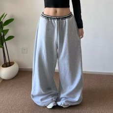 批发2026新款美式高街简约纯色<b class='q'>休闲</b>裤百搭运动大码街舞男女弯刀卫裤