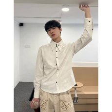 批发条纹纽扣长袖衬衫<b class='q'>男</b>女款设计感国风衬衣2026年春季新上衣情侣