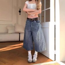 批发<b class='q'>设计</b>感口袋拼接格子牛仔裤女2025年夏季新款高腰直筒七分牛仔中裤