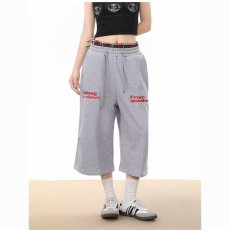 批发美式复古腰绳设计感休闲弯刀卫裤<b class='q'>男</b>女潮牌爵士舞运动宽松七分<b class='q'>裤子</b>