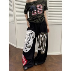 批发美式<b class='q'>街头</b>解构涂鸦设计迷彩布贴拼接休闲裤男女阔腿弯刀卫裤长裤潮