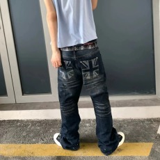 批发美式高街十字架<b class='q'>设计</b>感牛仔裤男秋季宽松柳钉直筒深蓝色微喇长裤潮